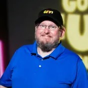 George Ruch in a GFY1 hat on the Go Fund Yourself set
