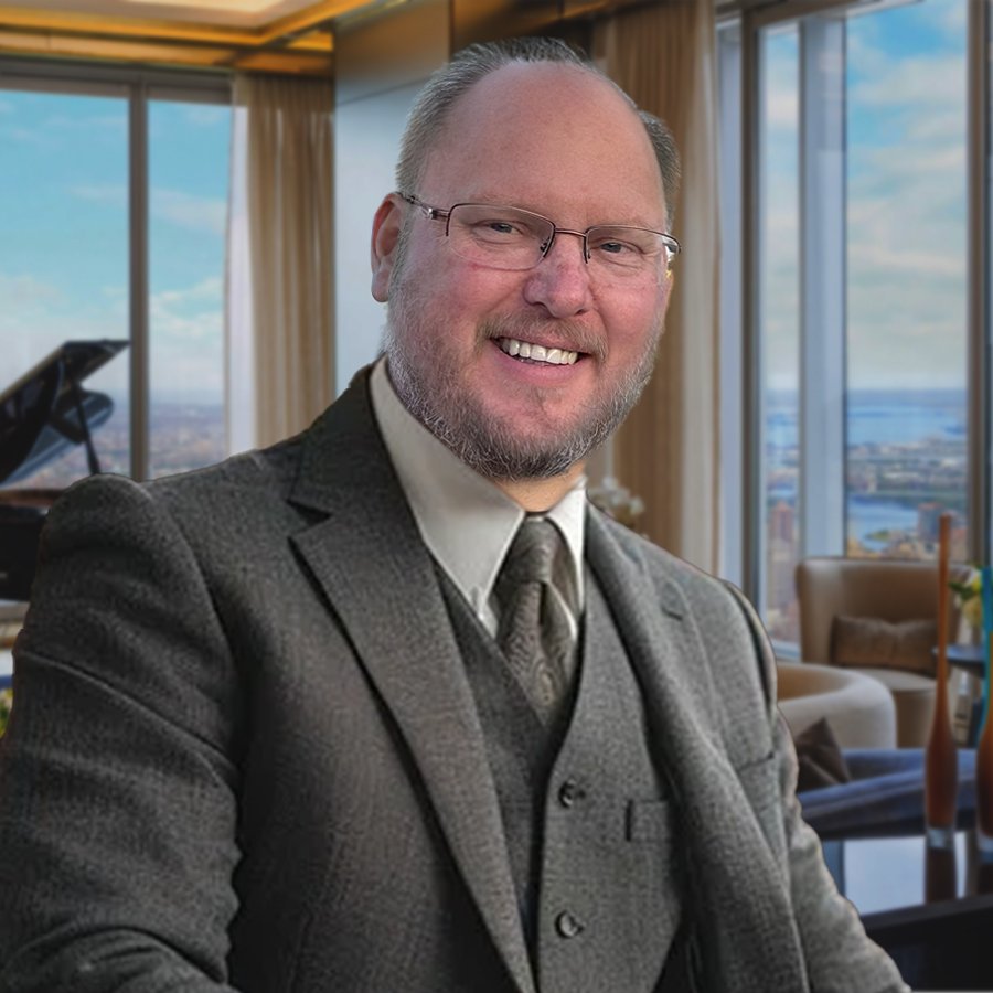 George Ruch in a gray three-piece suit
